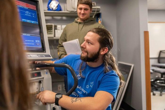 Student works with hospital equipment in biomedical engineering lab