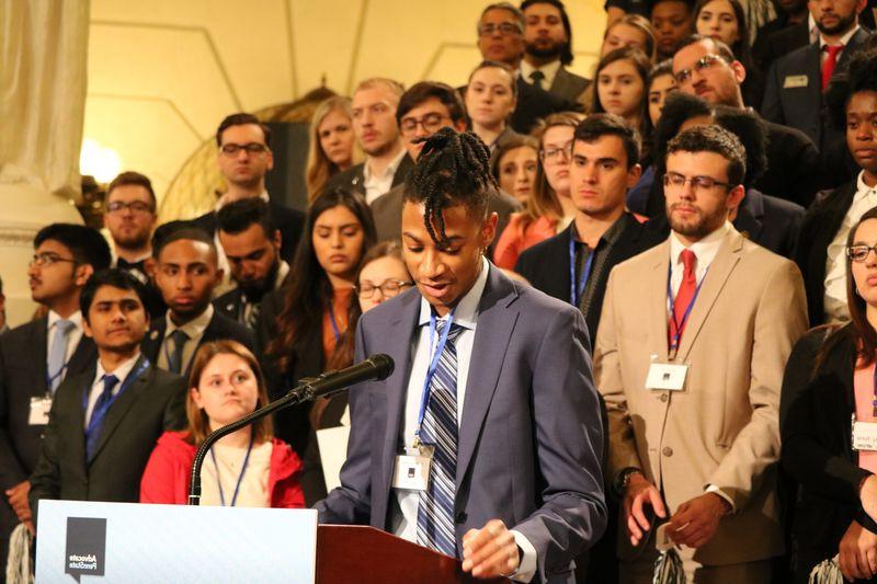 Student speaks at podium