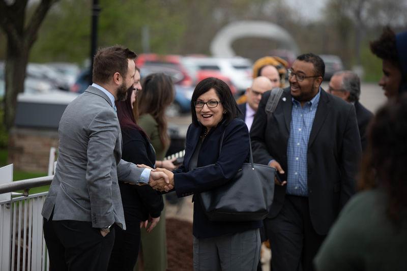 President-elect Neeli Bendapudi shakes hands