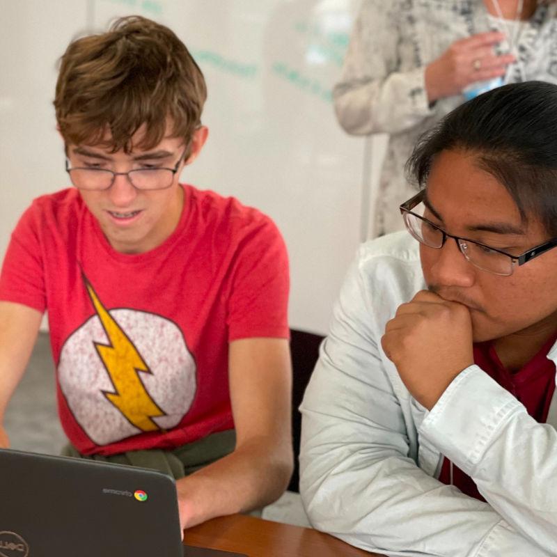 Students working on a computer.