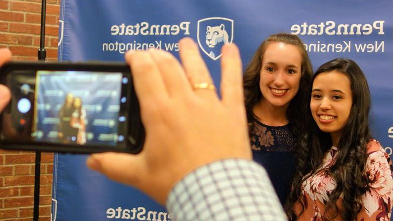 Paulina Iniguez and Gina Batiz smile for a photo