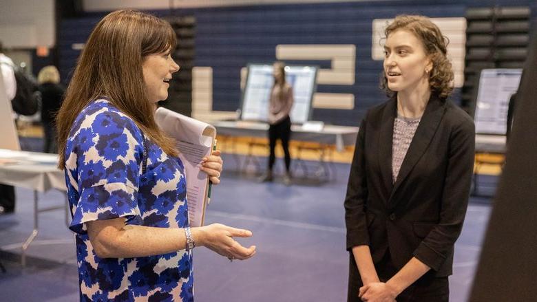 Two females talking