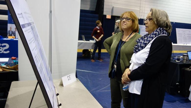 Marcella Moore, student, presents research and poster