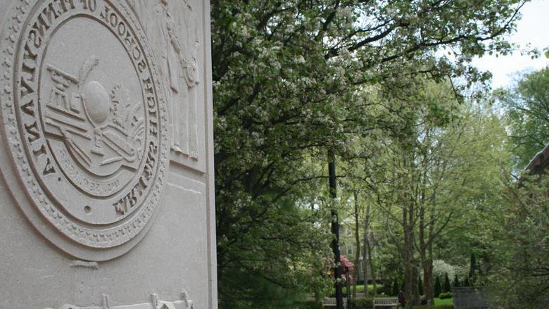 Inscribed pillar in back of HUB at Penn State